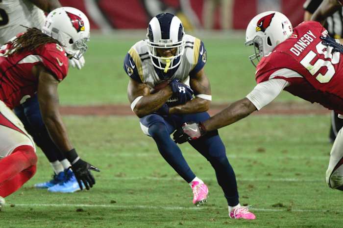 Dec 3, 2017; Glendale, AZ, USA; Los Angeles Rams wide receiver Tavon Austin (11) runs the ball as Arizona Cardinals linebacker Chandler Jones (55) defends during the second half at University of Phoenix Stadium.